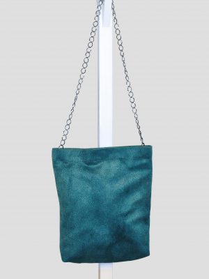 Indoor shoot of waterproof green fabric bag