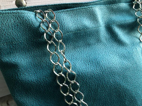 Waterproof green big fabric bag hanger detail