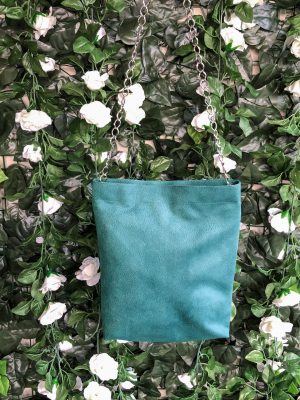 Front of green waterproof fabric bag on hanger