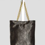 Indoor shoot of herringbone design textured bag