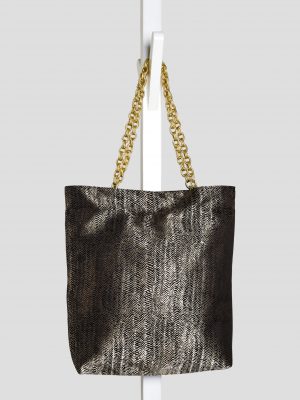 Indoor shoot of herringbone design textured bag