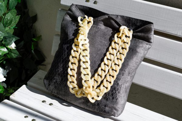 Cream color double hanger of fabric bag