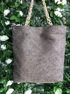 Front of beige fabric bag on the bag hanger