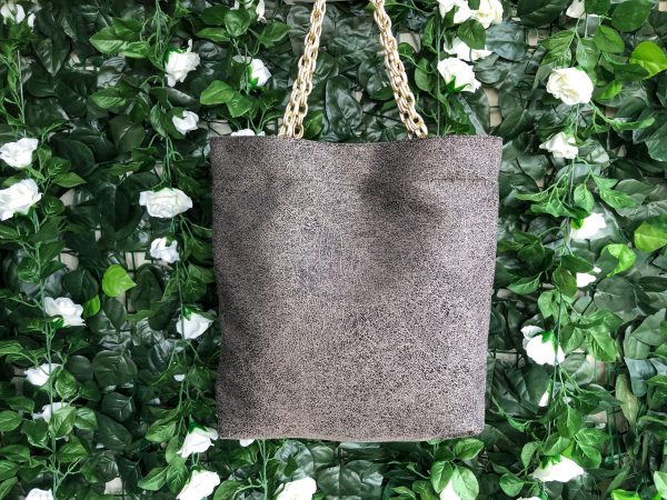 Front of beige fabric bag on the bag hanger