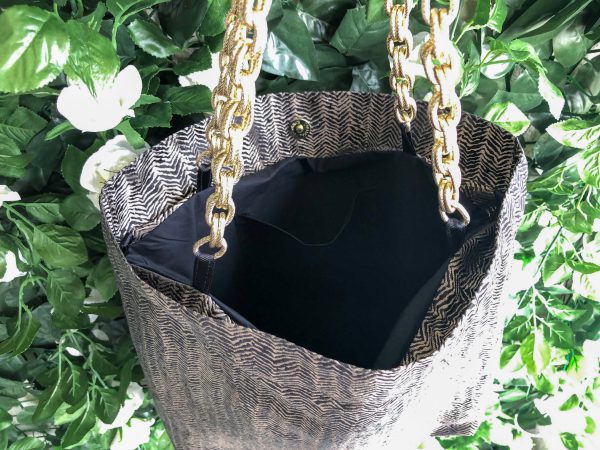 Interior detail of herringbone design textured bag